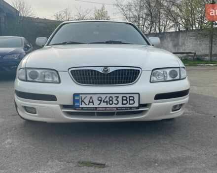 Белый Мазда Кседос 9, объемом двигателя 2.5 л и пробегом 410 тыс. км за 3200 $, фото 1 на Automoto.ua