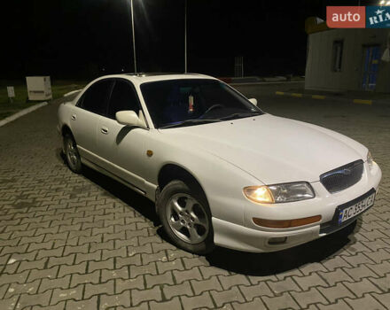 Белый Мазда Кседос 9, объемом двигателя 2 л и пробегом 304 тыс. км за 2500 $, фото 1 на Automoto.ua