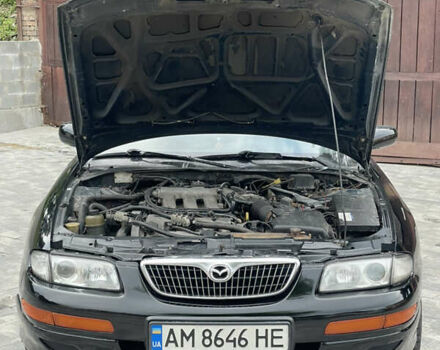 Черный Мазда Кседос 9, объемом двигателя 2.5 л и пробегом 256 тыс. км за 2100 $, фото 11 на Automoto.ua