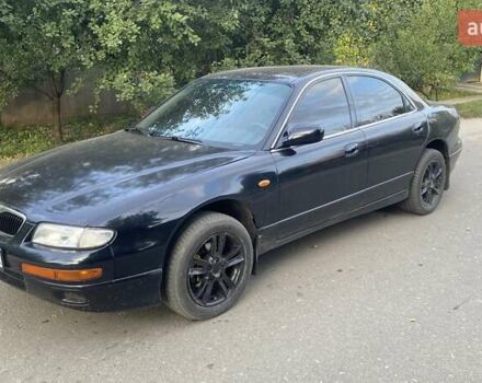 Черный Мазда Кседос 9, объемом двигателя 2 л и пробегом 347 тыс. км за 1900 $, фото 1 на Automoto.ua