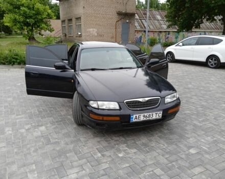 Чорний Мазда Кседос 9, об'ємом двигуна 2 л та пробігом 340 тис. км за 2800 $, фото 1 на Automoto.ua