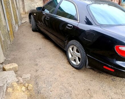 Чорний Мазда Кседос 9, об'ємом двигуна 2.5 л та пробігом 0 тис. км за 2000 $, фото 4 на Automoto.ua