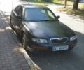 Черный Мазда Кседос 9, объемом двигателя 2 л и пробегом 440 тыс. км за 2500 $, фото 1 на Automoto.ua