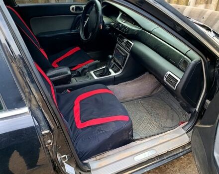 Чорний Мазда Кседос 9, об'ємом двигуна 2.5 л та пробігом 0 тис. км за 2000 $, фото 6 на Automoto.ua