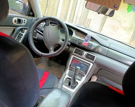 Чорний Мазда Кседос 9, об'ємом двигуна 2.5 л та пробігом 0 тис. км за 2000 $, фото 5 на Automoto.ua