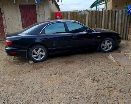 Чорний Мазда Кседос 9, об'ємом двигуна 2.5 л та пробігом 0 тис. км за 2000 $, фото 9 на Automoto.ua