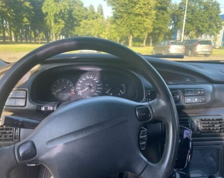 Черный Мазда Кседос 9, объемом двигателя 2 л и пробегом 3 тыс. км за 1800 $, фото 5 на Automoto.ua