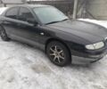 Чорний Мазда Кседос 9, об'ємом двигуна 2.5 л та пробігом 3 тис. км за 3300 $, фото 1 на Automoto.ua