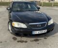 Черный Мазда Кседос 9, объемом двигателя 2.5 л и пробегом 224 тыс. км за 2099 $, фото 1 на Automoto.ua