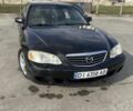Чорний Мазда Кседос 9, об'ємом двигуна 2.5 л та пробігом 224 тис. км за 2099 $, фото 1 на Automoto.ua