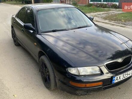 Черный Мазда Кседос 9, объемом двигателя 2 л и пробегом 347 тыс. км за 1900 $, фото 1 на Automoto.ua