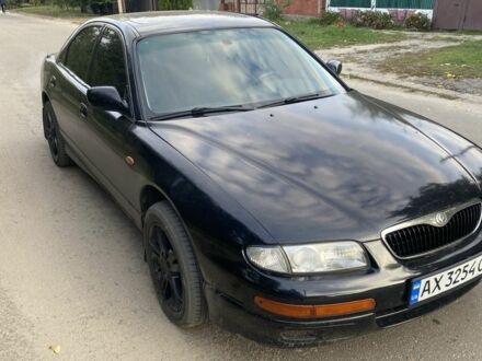 Черный Мазда Кседос 9, объемом двигателя 2 л и пробегом 347 тыс. км за 1900 $, фото 1 на Automoto.ua