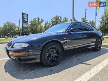 Мазда Кседос 9 1994 у Кременчуге на Automoto.ua Чорний Мазда Кседос 9, об'ємом двигуна 2 л та пробігом 300 тис. км за 1999 $, фото 1 на Automoto.ua