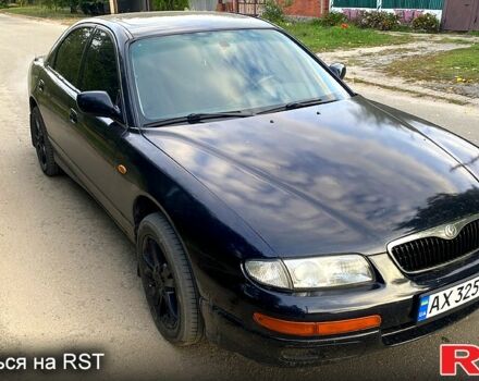 Черный Мазда Кседос 9, объемом двигателя 2 л и пробегом 347 тыс. км за 2400 $, фото 1 на Automoto.ua