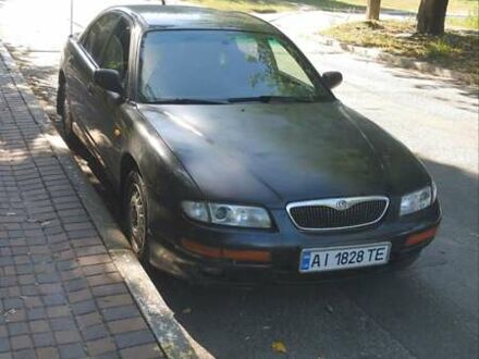 Чорний Мазда Кседос 9, об'ємом двигуна 2 л та пробігом 440 тис. км за 2500 $, фото 1 на Automoto.ua