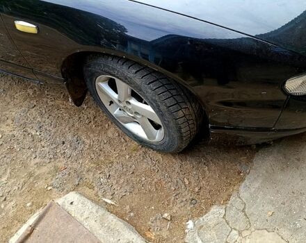 Чорний Мазда Кседос 9, об'ємом двигуна 2.5 л та пробігом 0 тис. км за 2000 $, фото 1 на Automoto.ua