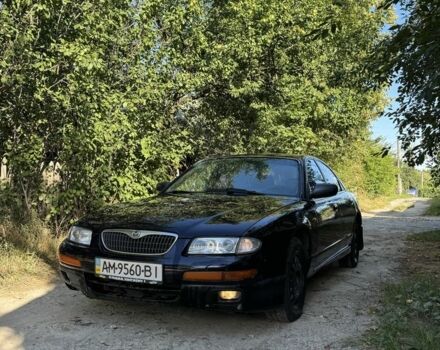 Черный Мазда Кседос 9, объемом двигателя 2 л и пробегом 300 тыс. км за 650 $, фото 1 на Automoto.ua