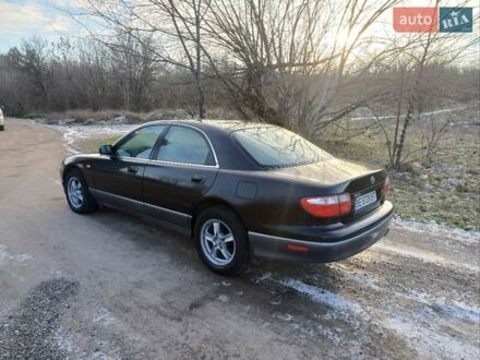 Черный Мазда Кседос 9, объемом двигателя 2.26 л и пробегом 260 тыс. км за 2500 $, фото 1 на Automoto.ua