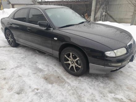 Черный Мазда Кседос 9, объемом двигателя 2.5 л и пробегом 3 тыс. км за 3300 $, фото 1 на Automoto.ua