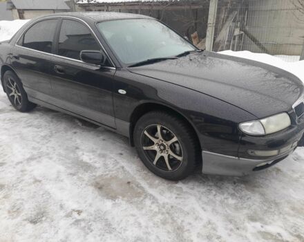 Черный Мазда Кседос 9, объемом двигателя 2.5 л и пробегом 3 тыс. км за 3300 $, фото 1 на Automoto.ua