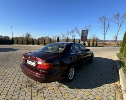 Красный Мазда Кседос 9, объемом двигателя 2.5 л и пробегом 200 тыс. км за 1850 $, фото 4 на Automoto.ua