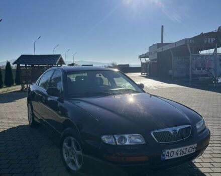 Красный Мазда Кседос 9, объемом двигателя 2.5 л и пробегом 200 тыс. км за 1850 $, фото 2 на Automoto.ua