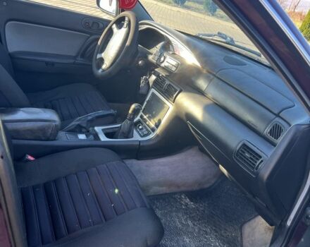 Красный Мазда Кседос 9, объемом двигателя 2.5 л и пробегом 200 тыс. км за 1850 $, фото 5 на Automoto.ua