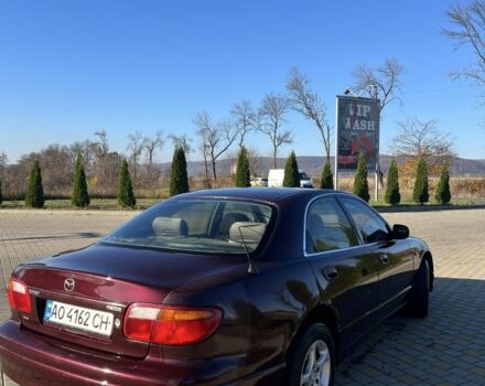 Красный Мазда Кседос 9, объемом двигателя 2.5 л и пробегом 200 тыс. км за 1850 $, фото 7 на Automoto.ua