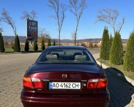 Красный Мазда Кседос 9, объемом двигателя 2.5 л и пробегом 200 тыс. км за 1850 $, фото 3 на Automoto.ua