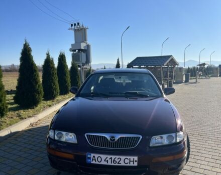 Красный Мазда Кседос 9, объемом двигателя 2.5 л и пробегом 200 тыс. км за 1850 $, фото 1 на Automoto.ua