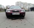 Красный Мазда Кседос 9, объемом двигателя 2 л и пробегом 388 тыс. км за 2500 $, фото 1 на Automoto.ua