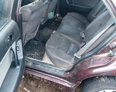 Червоний Мазда Кседос 9, об'ємом двигуна 2 л та пробігом 300 тис. км за 1000 $, фото 1 на Automoto.ua