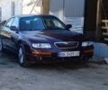 Червоний Мазда Кседос 9, об'ємом двигуна 2 л та пробігом 186 тис. км за 1800 $, фото 1 на Automoto.ua