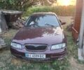 Красный Мазда Кседос 9, объемом двигателя 2 л и пробегом 150 тыс. км за 1500 $, фото 1 на Automoto.ua