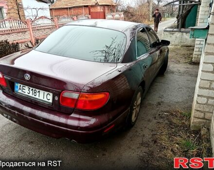 Красный Мазда Кседос 9, объемом двигателя 2 л и пробегом 200 тыс. км за 2500 $, фото 2 на Automoto.ua