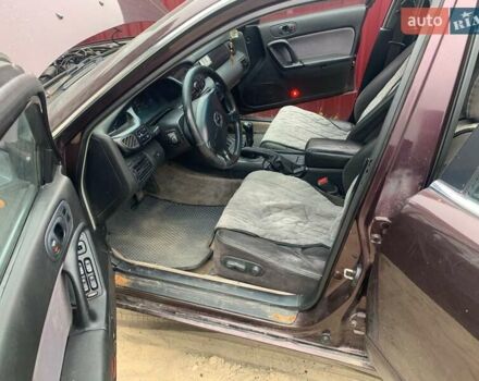 Красный Мазда Кседос 9, объемом двигателя 2 л и пробегом 285 тыс. км за 2000 $, фото 6 на Automoto.ua