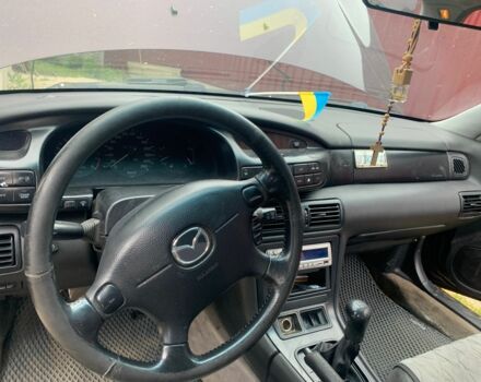 Червоний Мазда Кседос 9, об'ємом двигуна 2 л та пробігом 285 тис. км за 2000 $, фото 6 на Automoto.ua