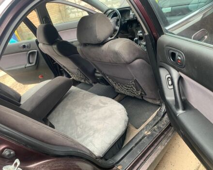 Червоний Мазда Кседос 9, об'ємом двигуна 2 л та пробігом 285 тис. км за 2000 $, фото 2 на Automoto.ua