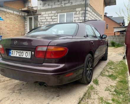 Червоний Мазда Кседос 9, об'ємом двигуна 2 л та пробігом 285 тис. км за 2000 $, фото 1 на Automoto.ua