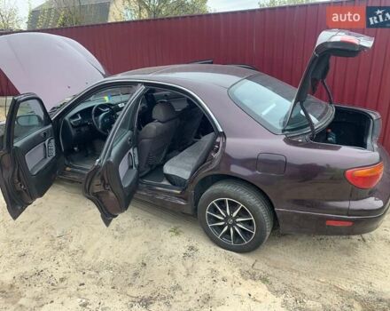 Красный Мазда Кседос 9, объемом двигателя 2 л и пробегом 285 тыс. км за 2000 $, фото 9 на Automoto.ua