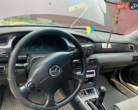 Красный Мазда Кседос 9, объемом двигателя 2 л и пробегом 285 тыс. км за 2000 $, фото 5 на Automoto.ua