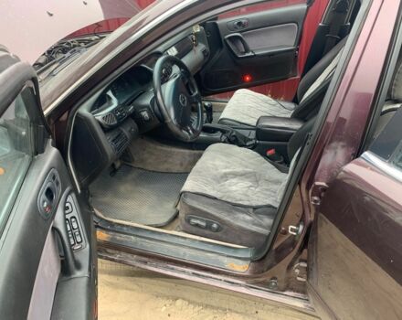 Червоний Мазда Кседос 9, об'ємом двигуна 2 л та пробігом 285 тис. км за 2000 $, фото 7 на Automoto.ua