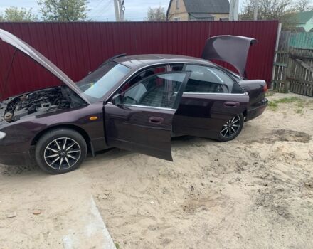 Червоний Мазда Кседос 9, об'ємом двигуна 2 л та пробігом 285 тис. км за 2000 $, фото 5 на Automoto.ua