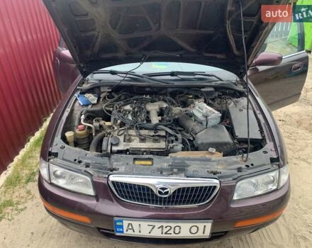 Красный Мазда Кседос 9, объемом двигателя 2 л и пробегом 285 тыс. км за 2000 $, фото 3 на Automoto.ua