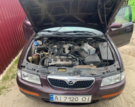 Червоний Мазда Кседос 9, об'ємом двигуна 2 л та пробігом 285 тис. км за 2000 $, фото 4 на Automoto.ua