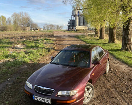 Червоний Мазда Кседос 9, об'ємом двигуна 2 л та пробігом 325 тис. км за 2700 $, фото 16 на Automoto.ua