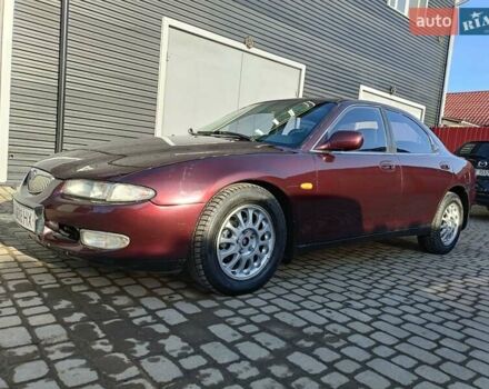 Красный Мазда Кседос 9, объемом двигателя 2 л и пробегом 240 тыс. км за 2050 $, фото 1 на Automoto.ua