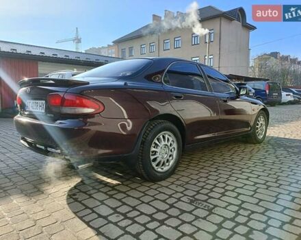 Красный Мазда Кседос 9, объемом двигателя 2 л и пробегом 240 тыс. км за 2050 $, фото 5 на Automoto.ua