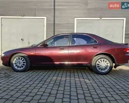 Красный Мазда Кседос 9, объемом двигателя 2 л и пробегом 240 тыс. км за 2050 $, фото 2 на Automoto.ua