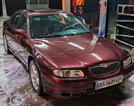 Красный Мазда Кседос 9, объемом двигателя 2 л и пробегом 388 тыс. км за 2500 $, фото 1 на Automoto.ua